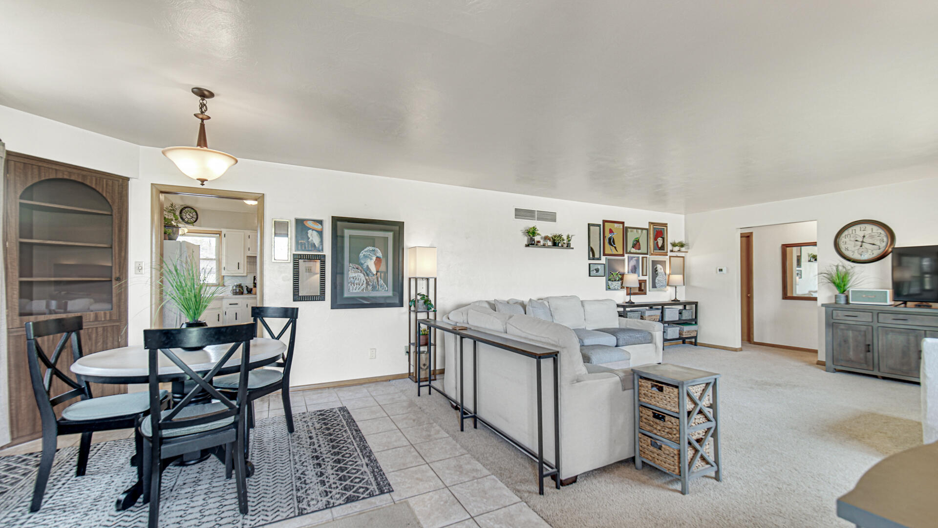 3232 Laporte Street Highland, IN 46322 - Photo 3 of 26 a view of a dining room with furniture and a chandelier