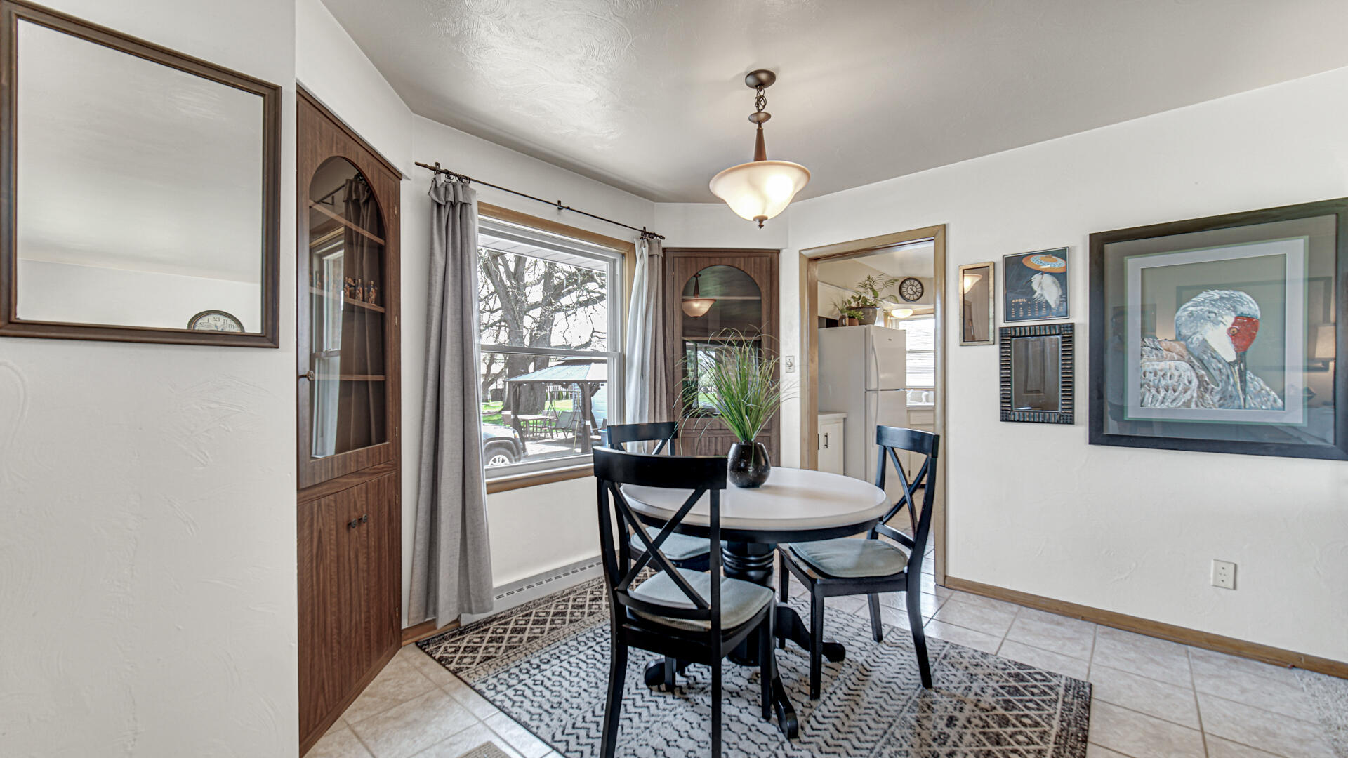 3232 Laporte Street Highland, IN 46322 - Photo 7 of 26 a view of a dining room with furniture window and wooden floor