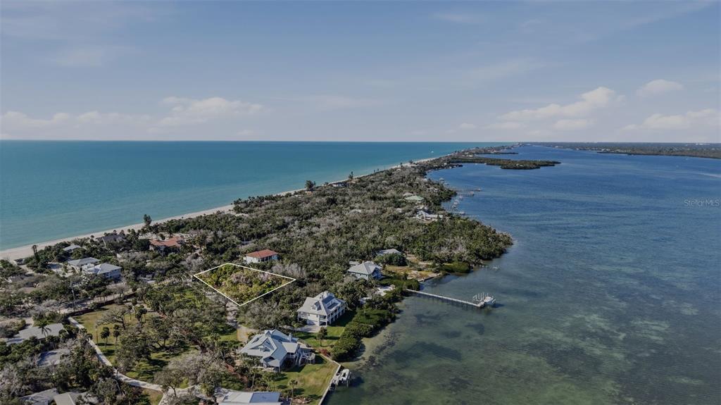 Manasota Key Road Englewood, FL 34223 - Photo 3 of 16 a view of a large yard with lots of green space