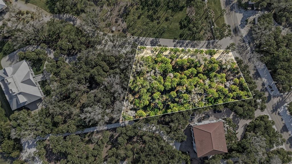 Manasota Key Road Englewood, FL 34223 - Photo 4 of 16 an aerial view of a house with a yard