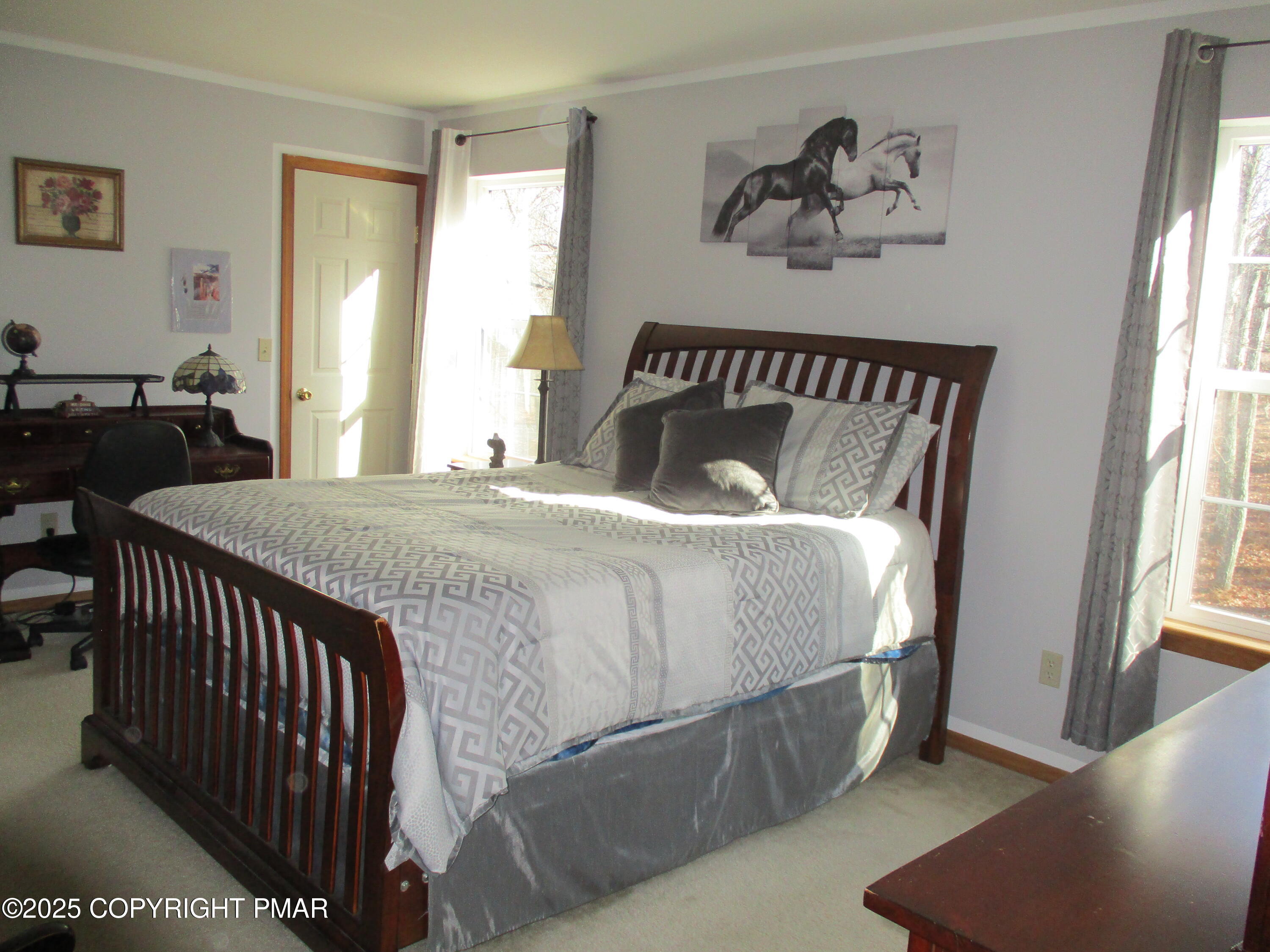 3290 Bluebird Drive Bushkill, PA 18324 - Photo 11 of 19 a bedroom with a bed and window