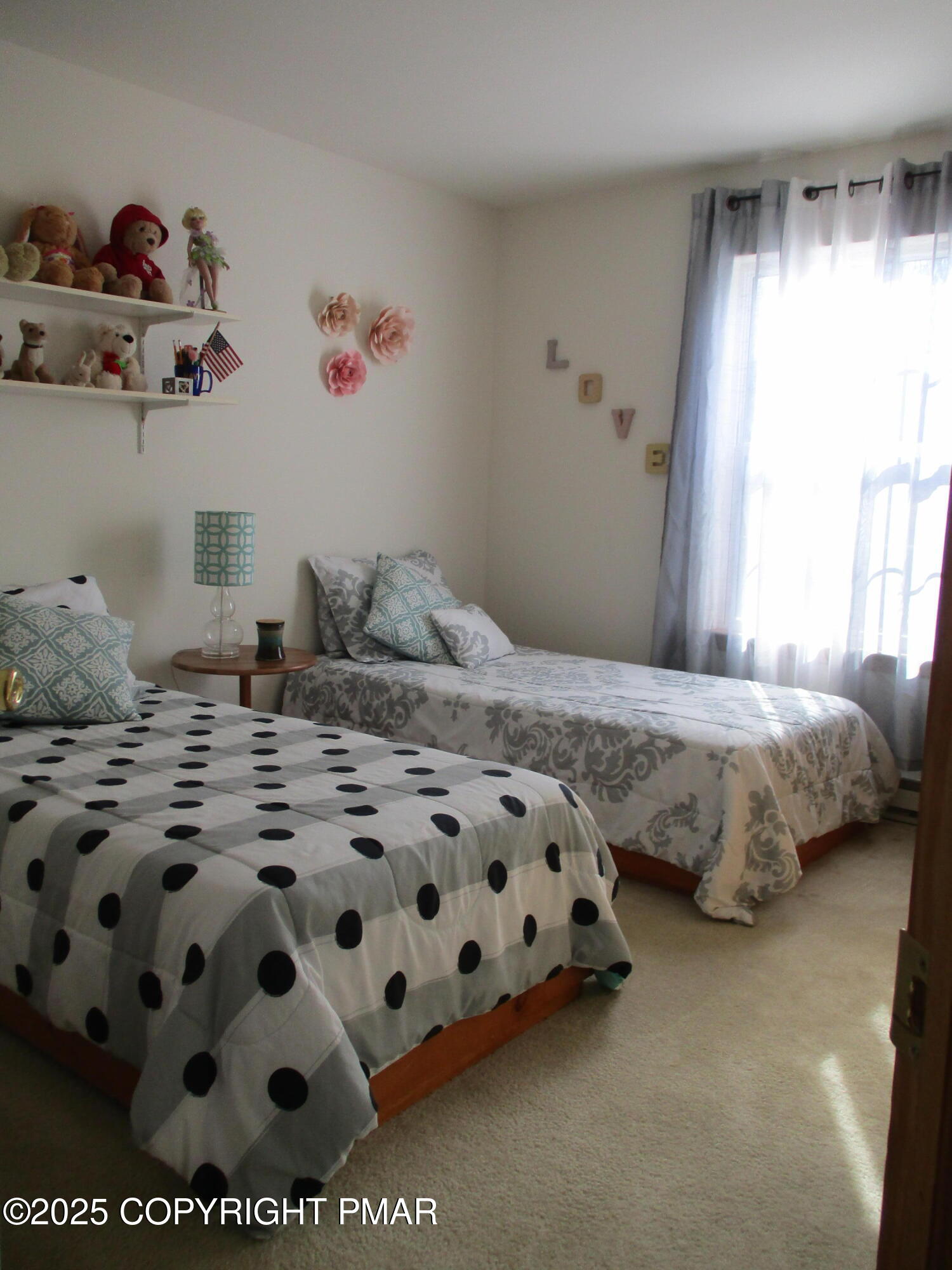 3290 Bluebird Drive Bushkill, PA 18324 - Photo 17 of 19 a bedroom with a bed and window