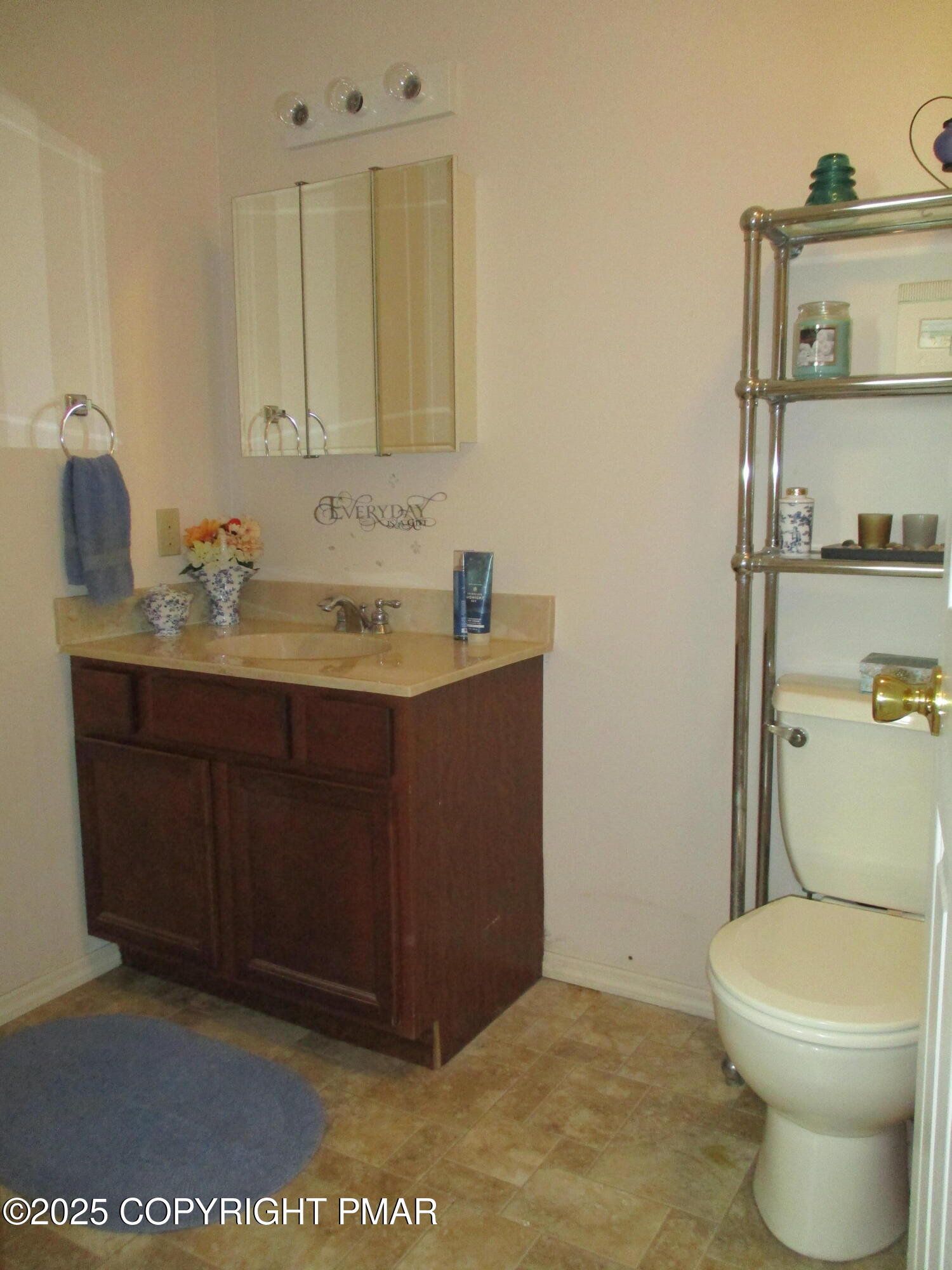3290 Bluebird Drive Bushkill, PA 18324 - Photo 8 of 19 a bathroom with a toilet sink and mirror