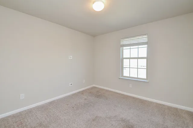 an empty room with a window