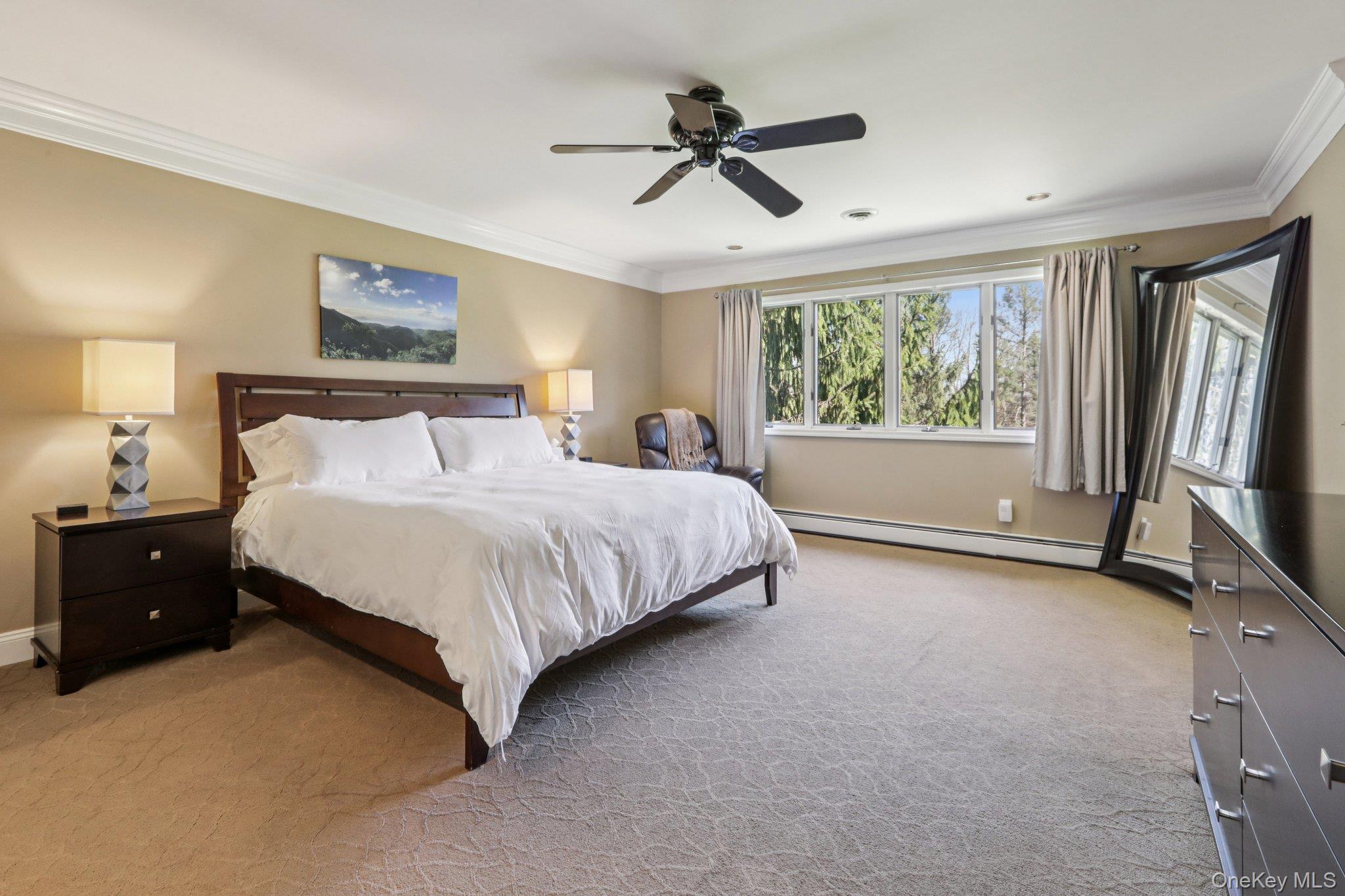 76 Waterbury Road Warwick, NY 10990 - Photo 35 of 46 Premier primary bedroom framed with beautiful crown moldings