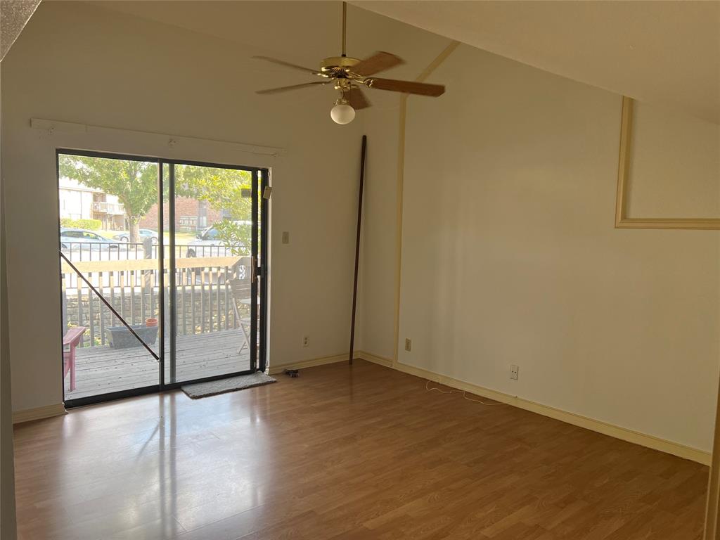 1522 Signal Ridge Place, Unit 1522 Rockwall, TX 75032 - Photo 12 of 28 an empty room with a window