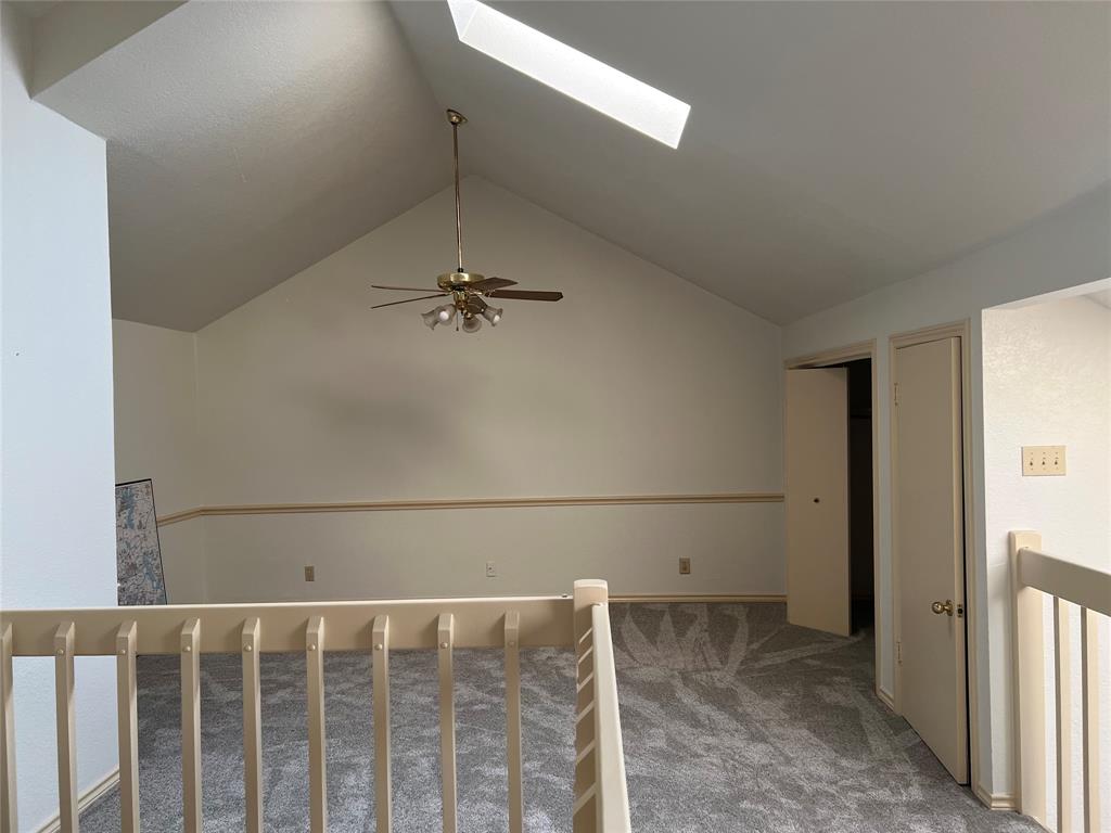 1522 Signal Ridge Place, Unit 1522 Rockwall, TX 75032 - Photo 20 of 28 a view of a livingroom with an empty space