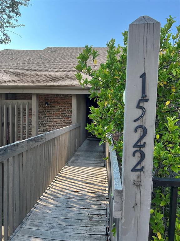 1522 Signal Ridge Place, Unit 1522 Rockwall, TX 75032 - Photo 28 of 28 a view of a pathway of a house with potted plants