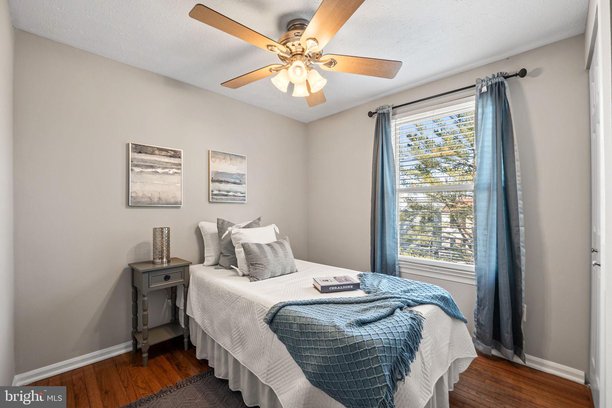 1747 Sundance Drive Reston, VA 20194 - Photo 19 of 36 a bedroom with a bed and a window