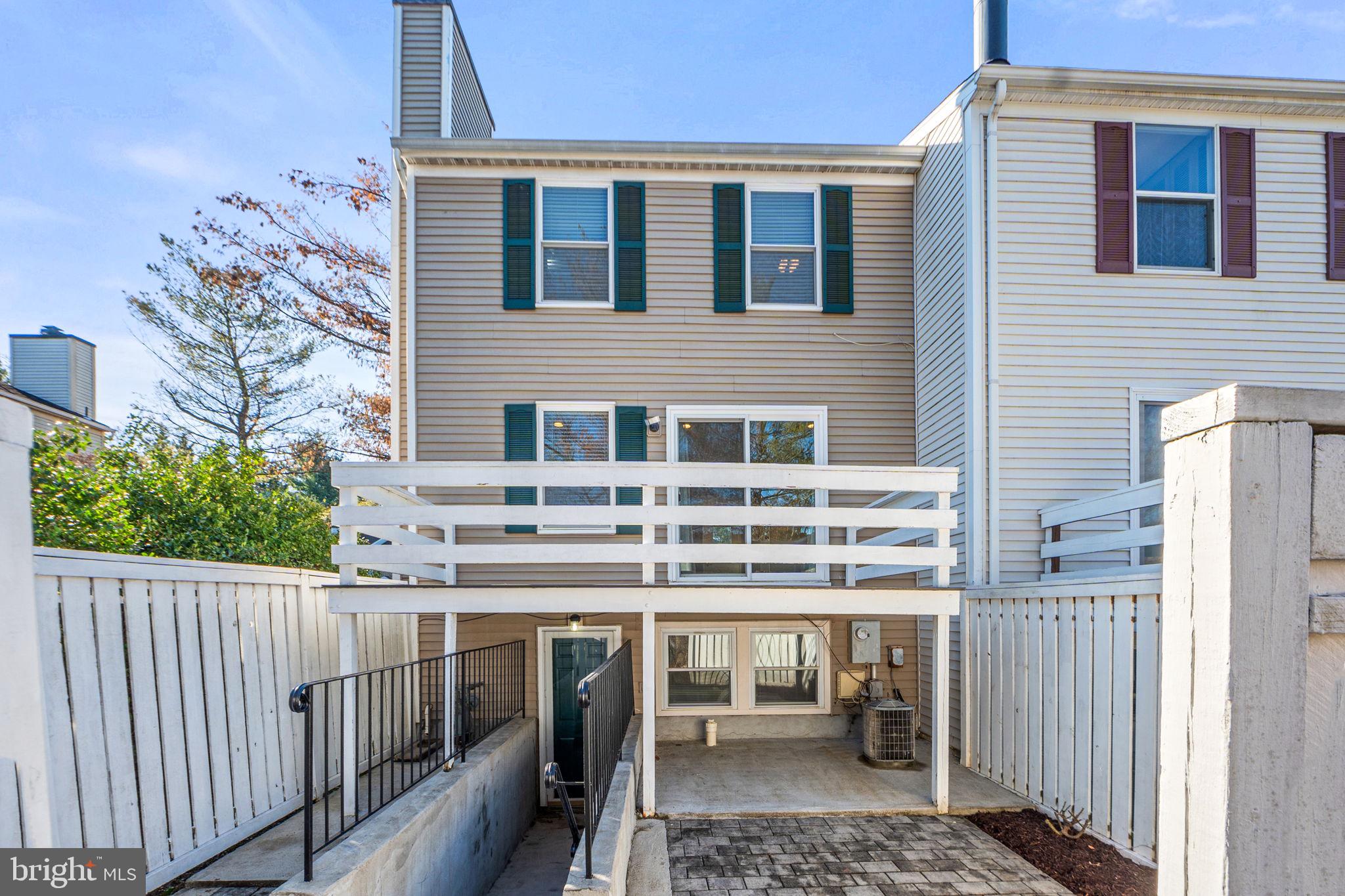 1747 Sundance Drive Reston, VA 20194 - Photo 29 of 36 a balcony view with a wooden floor and a window