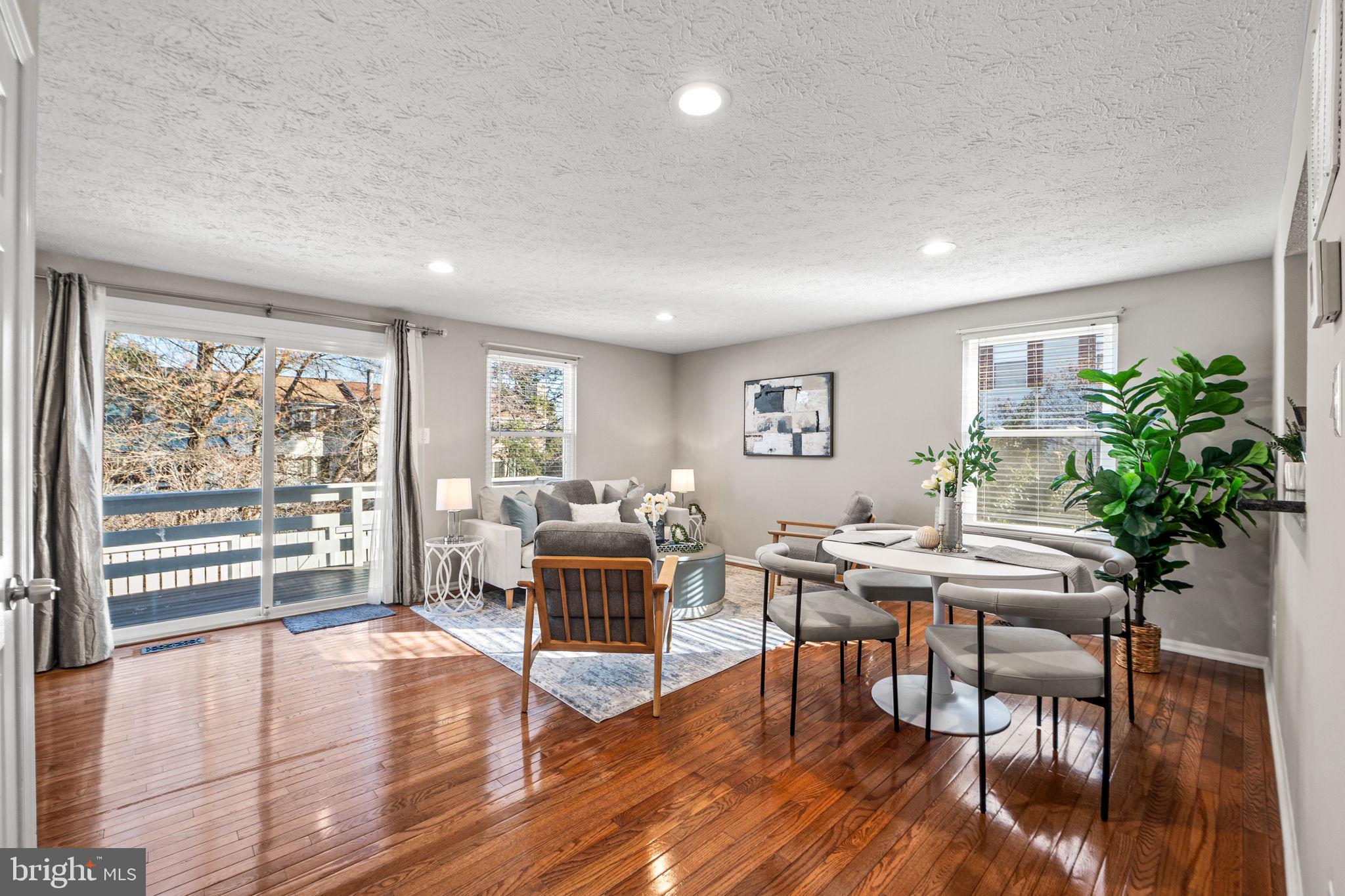 1747 Sundance Drive Reston, VA 20194 - Photo 9 of 36 a workspace with furniture window and wooden floor