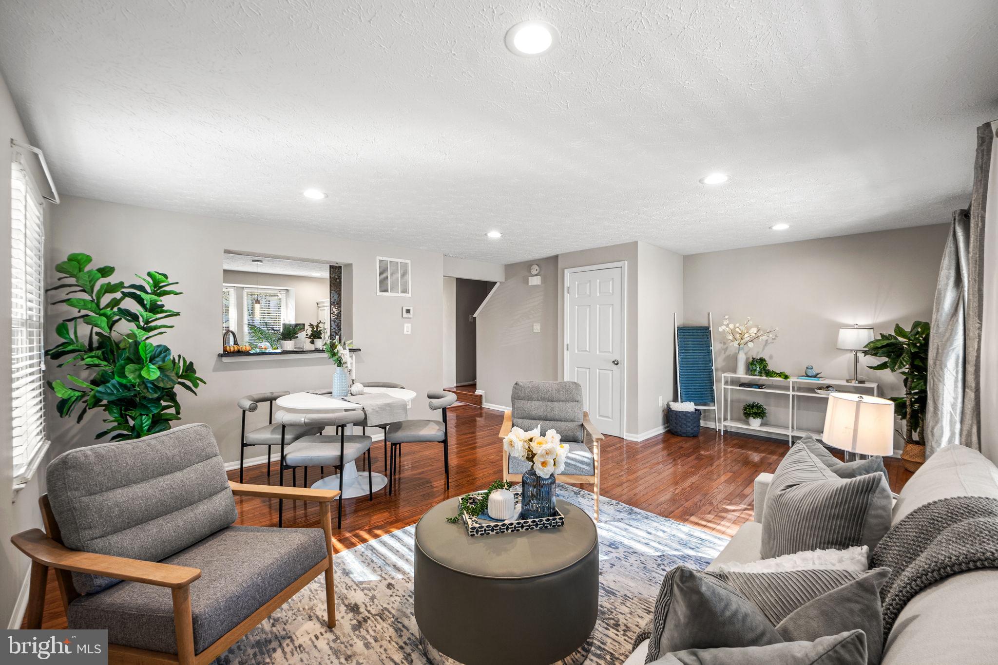 1747 Sundance Drive Reston, VA 20194 - Photo 10 of 36 a living room with furniture and a table