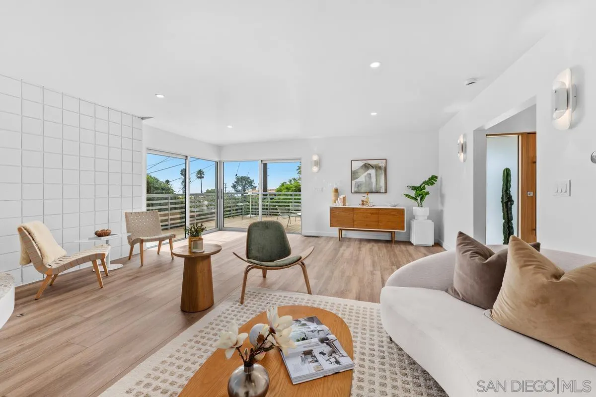 5851 Box Canyon Road La Jolla, CA 92037 - Photo 11 of 39 a living room with furniture large window and glass table