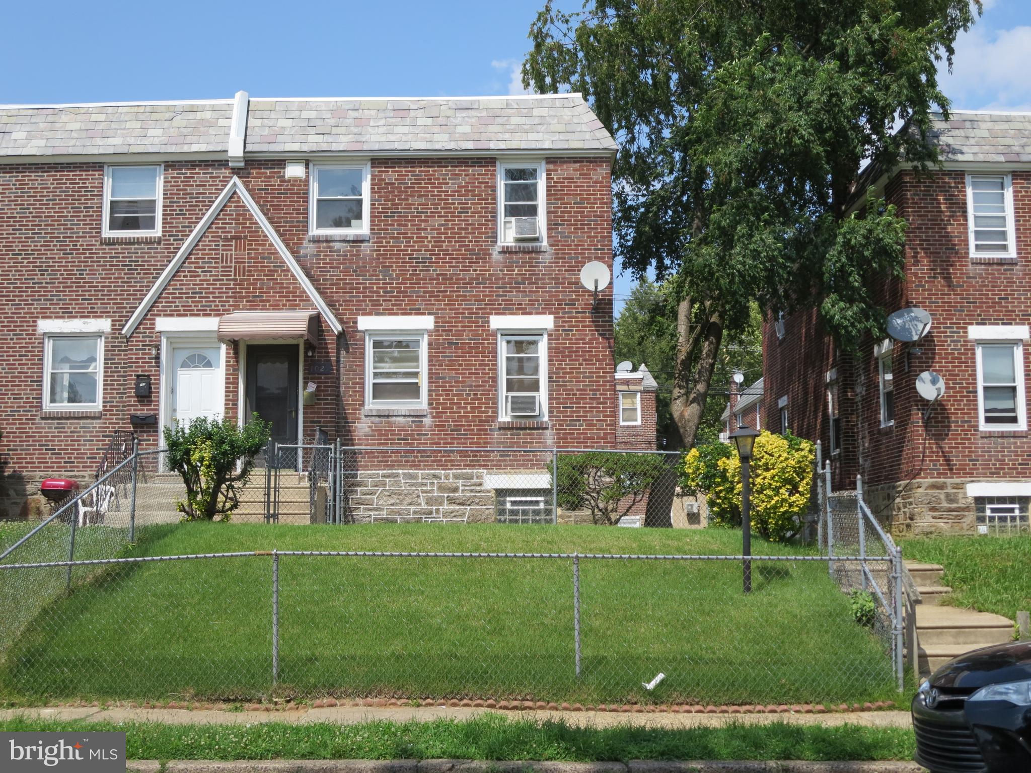 1025 Fanshawe Street Philadelphia, PA 19111 - Photo 1 of 13 a front view of a house with a garden