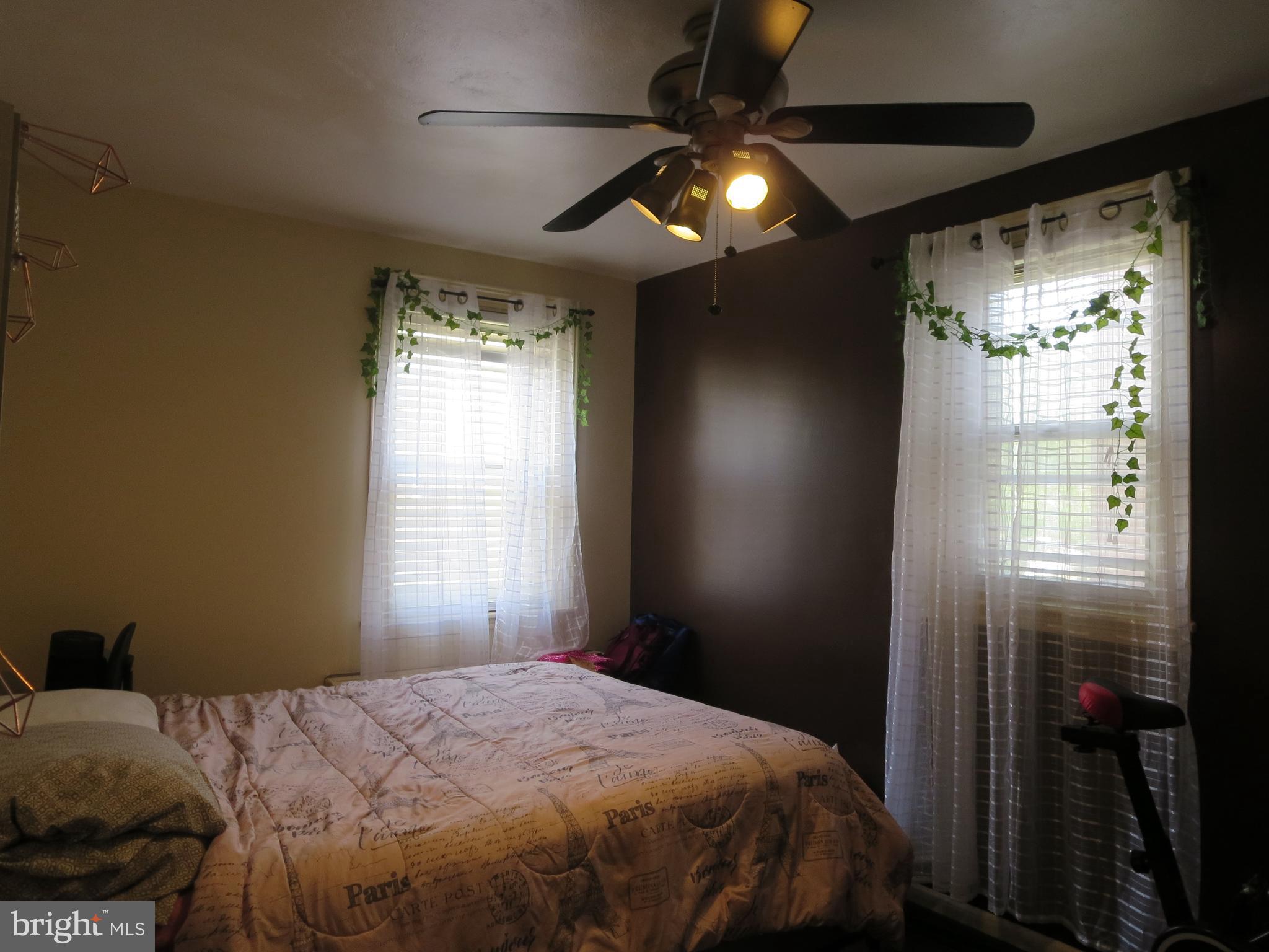 1025 Fanshawe Street Philadelphia, PA 19111 - Photo 6 of 13 a bedroom with a bed and a window