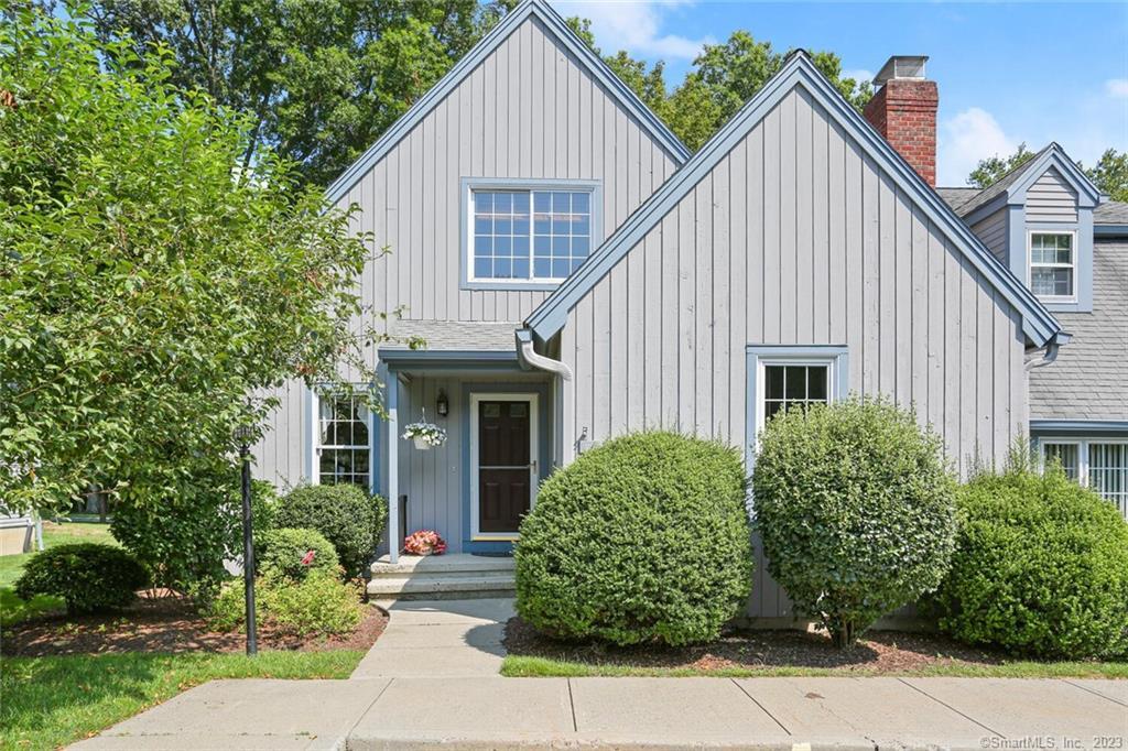 75 Gate Ridge Road, Unit 75 Fairfield, CT 06825 - Photo 1 of 1 a view of a house with potted plants and a yard