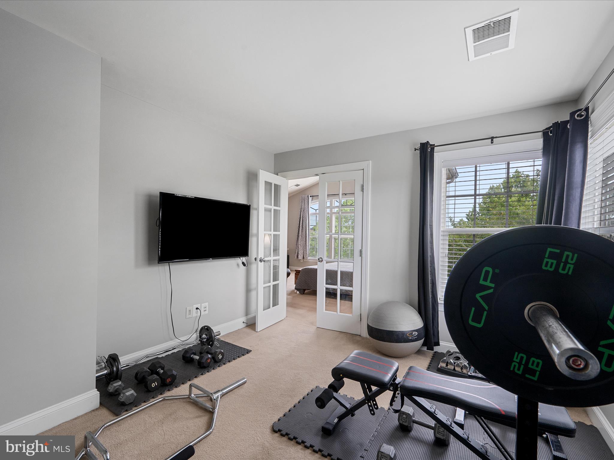 103 Prairie Place Stephenson, VA 22656 - Photo 21 of 90 a living room with furniture and a flat screen tv