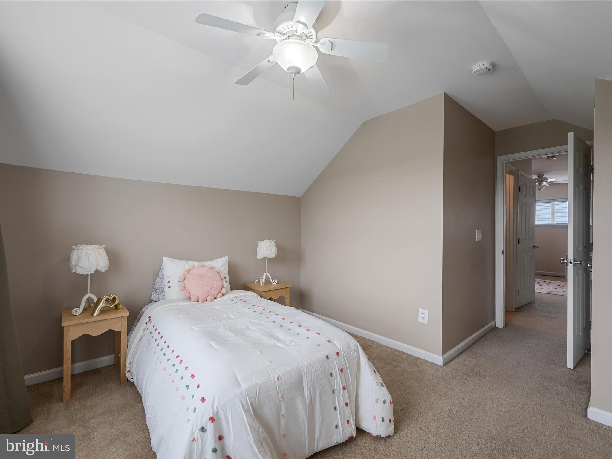 103 Prairie Place Stephenson, VA 22656 - Photo 29 of 90 a bedroom with a bed and a chandelier