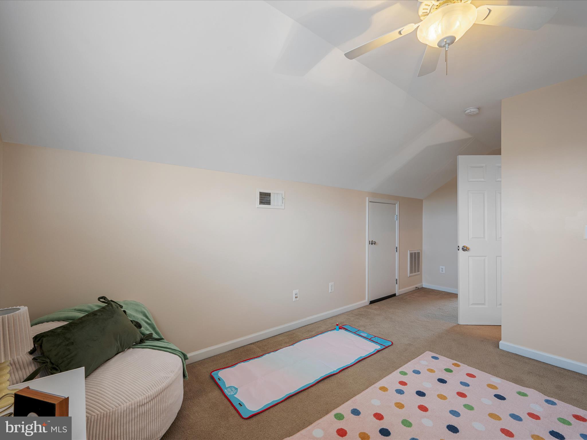 103 Prairie Place Stephenson, VA 22656 - Photo 31 of 90 a bedroom with a bed and a chandelier