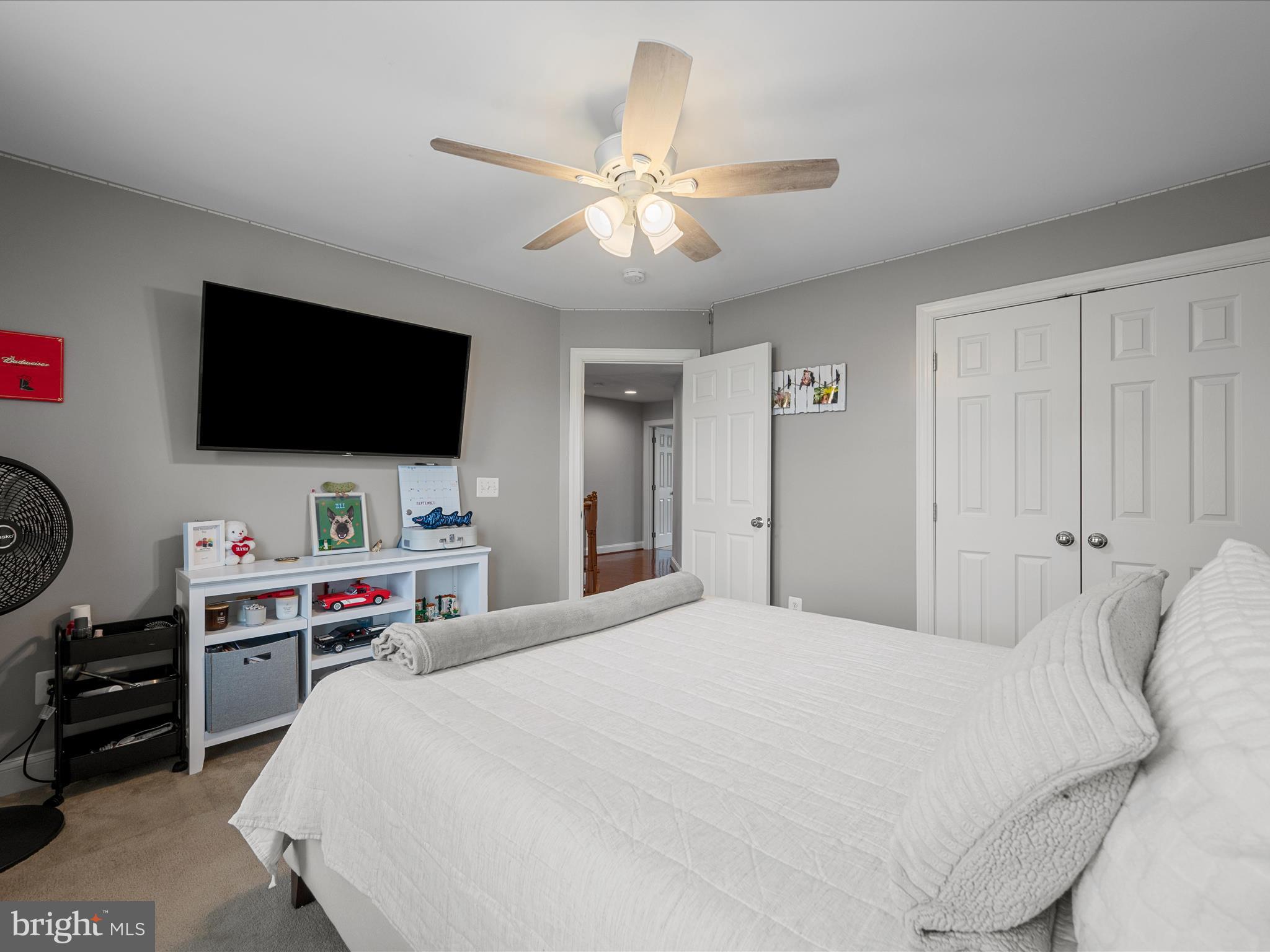 103 Prairie Place Stephenson, VA 22656 - Photo 35 of 90 a bedroom with a bed and a flat screen tv