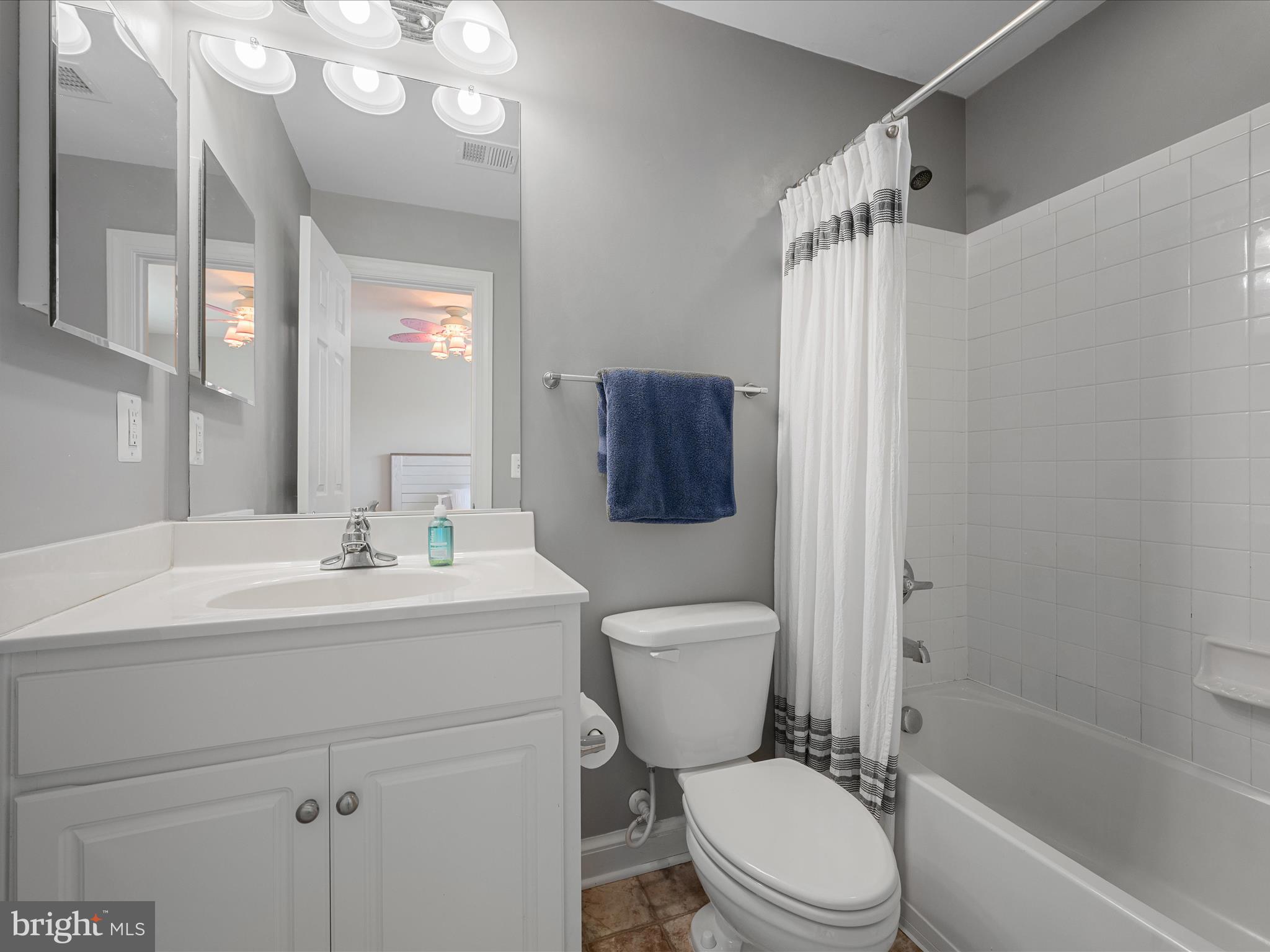 103 Prairie Place Stephenson, VA 22656 - Photo 40 of 90 a bathroom with a toilet a sink and a mirror