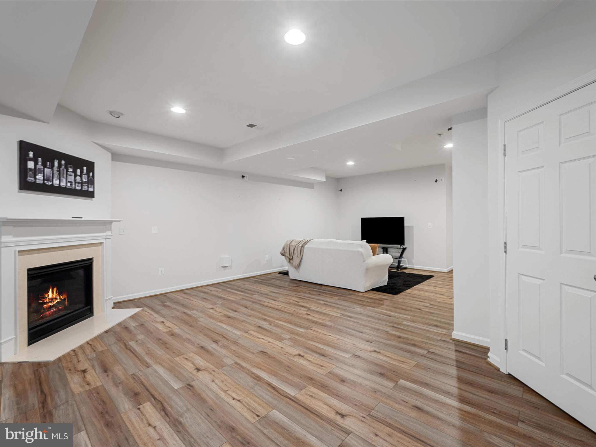 103 Prairie Place Stephenson, VA 22656 - Photo 46 of 90 a bedroom with a bed and a fireplace