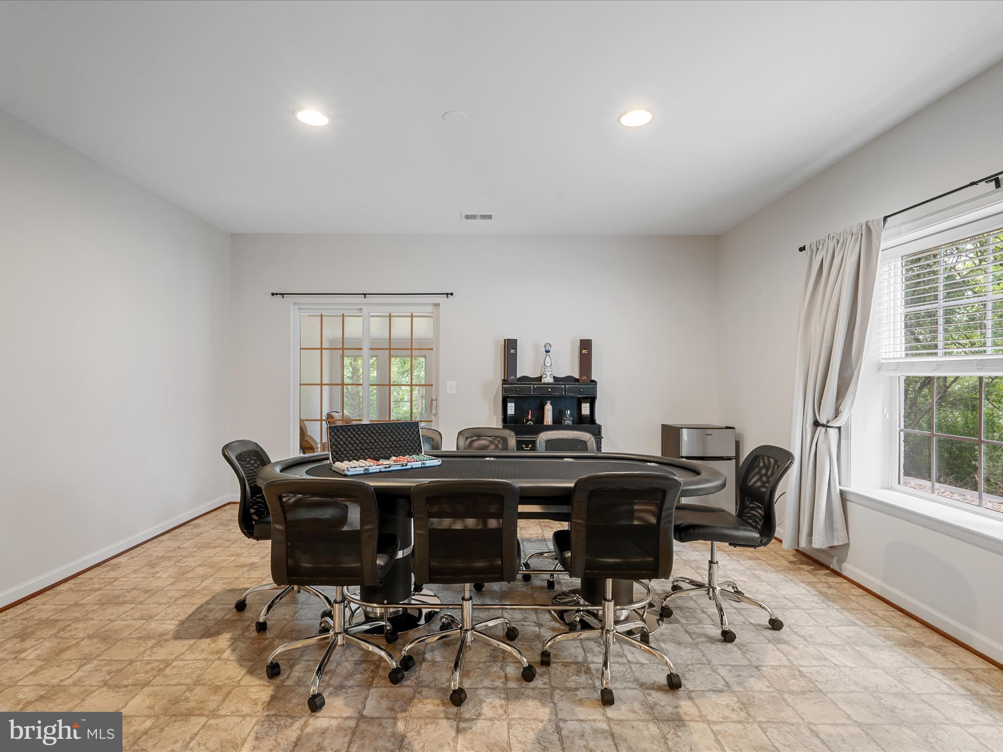 103 Prairie Place Stephenson, VA 22656 - Photo 49 of 90 a view of a workspace with furniture and a window