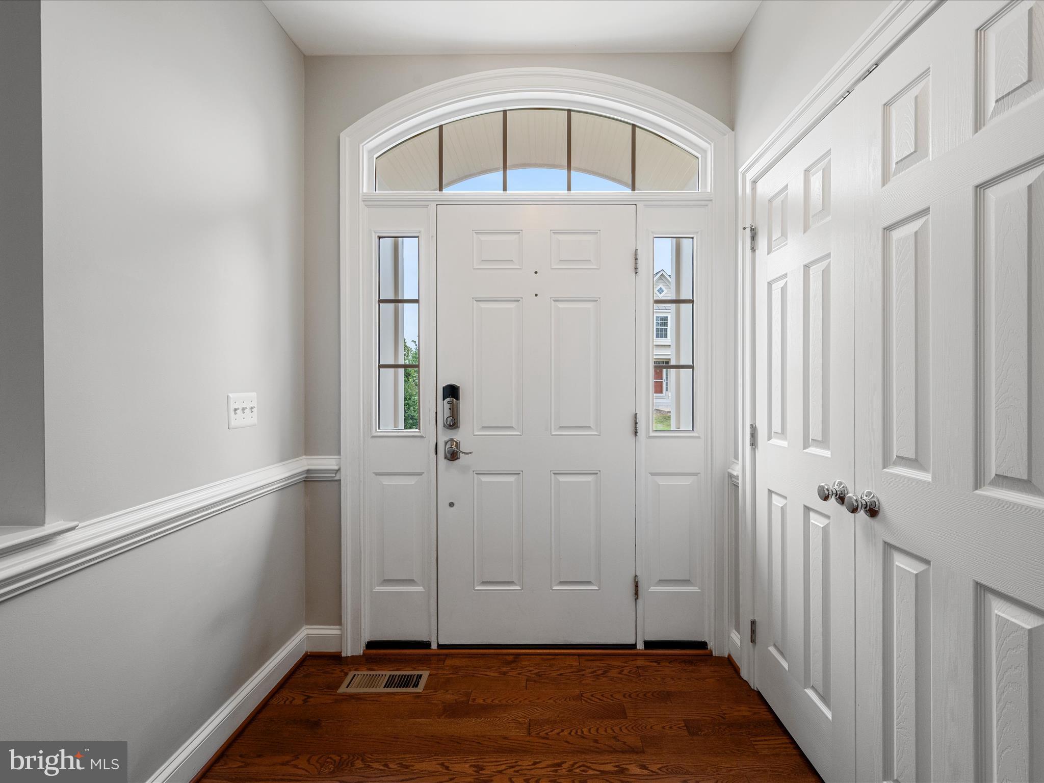 103 Prairie Place Stephenson, VA 22656 - Photo 5 of 90 a view of a hallway with wooden floor and entryway