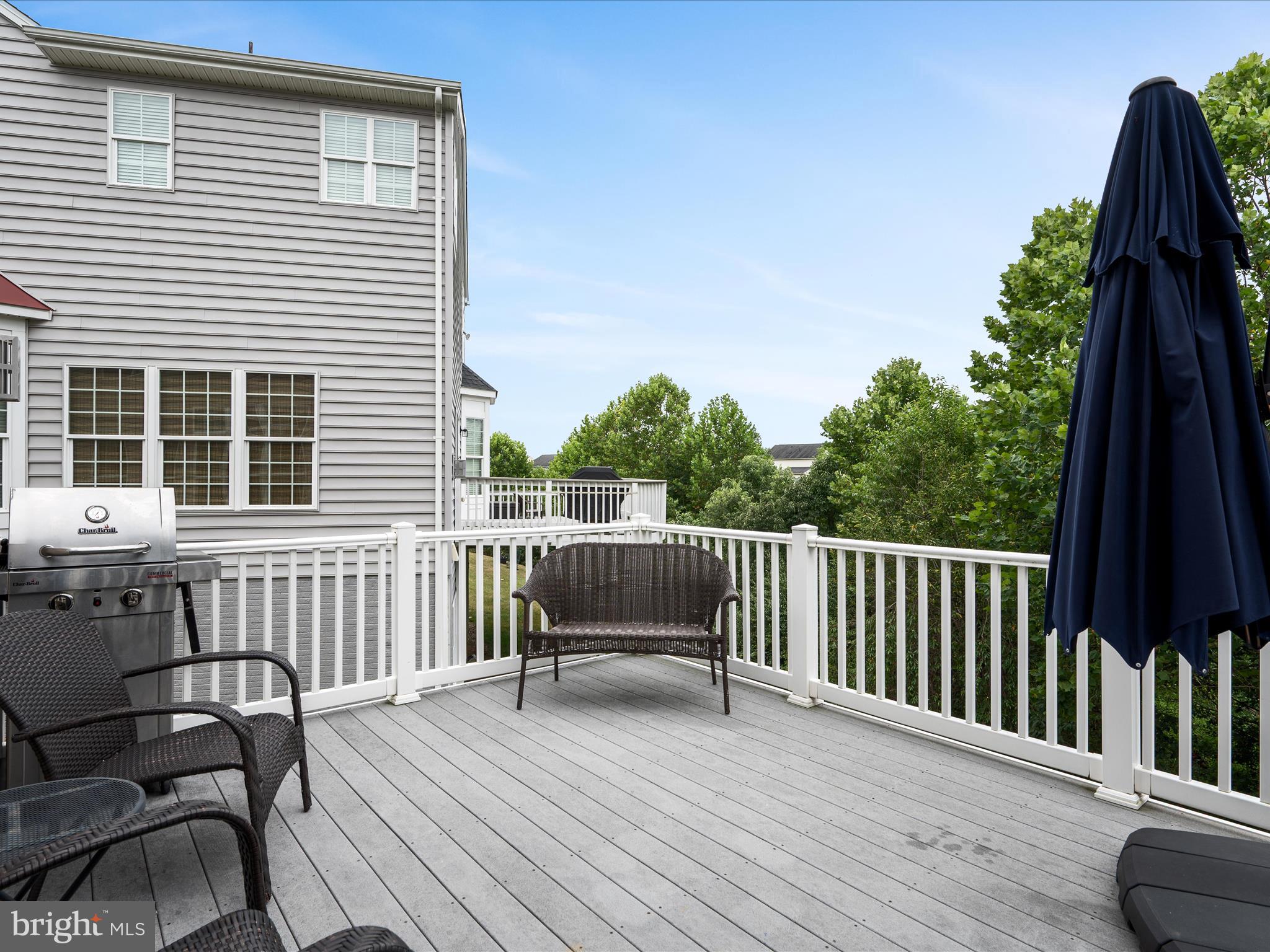 103 Prairie Place Stephenson, VA 22656 - Photo 56 of 90 a view of a wooden chairs and bench in the balcony
