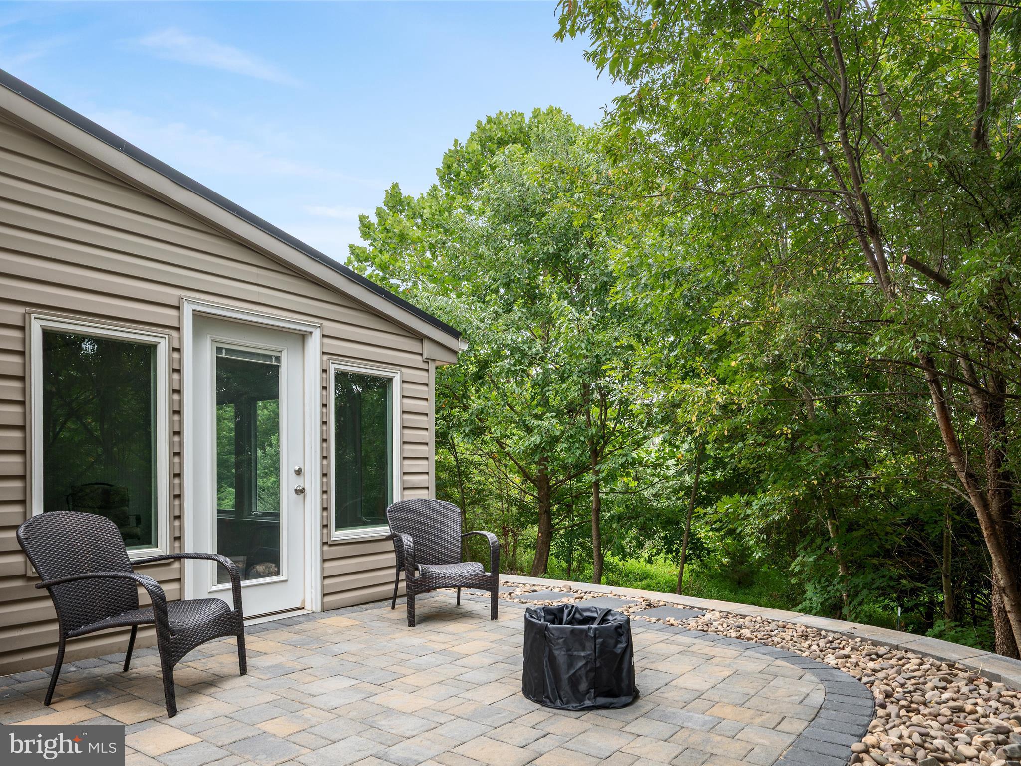103 Prairie Place Stephenson, VA 22656 - Photo 58 of 90 a view of a patio with table and chairs and potted plants