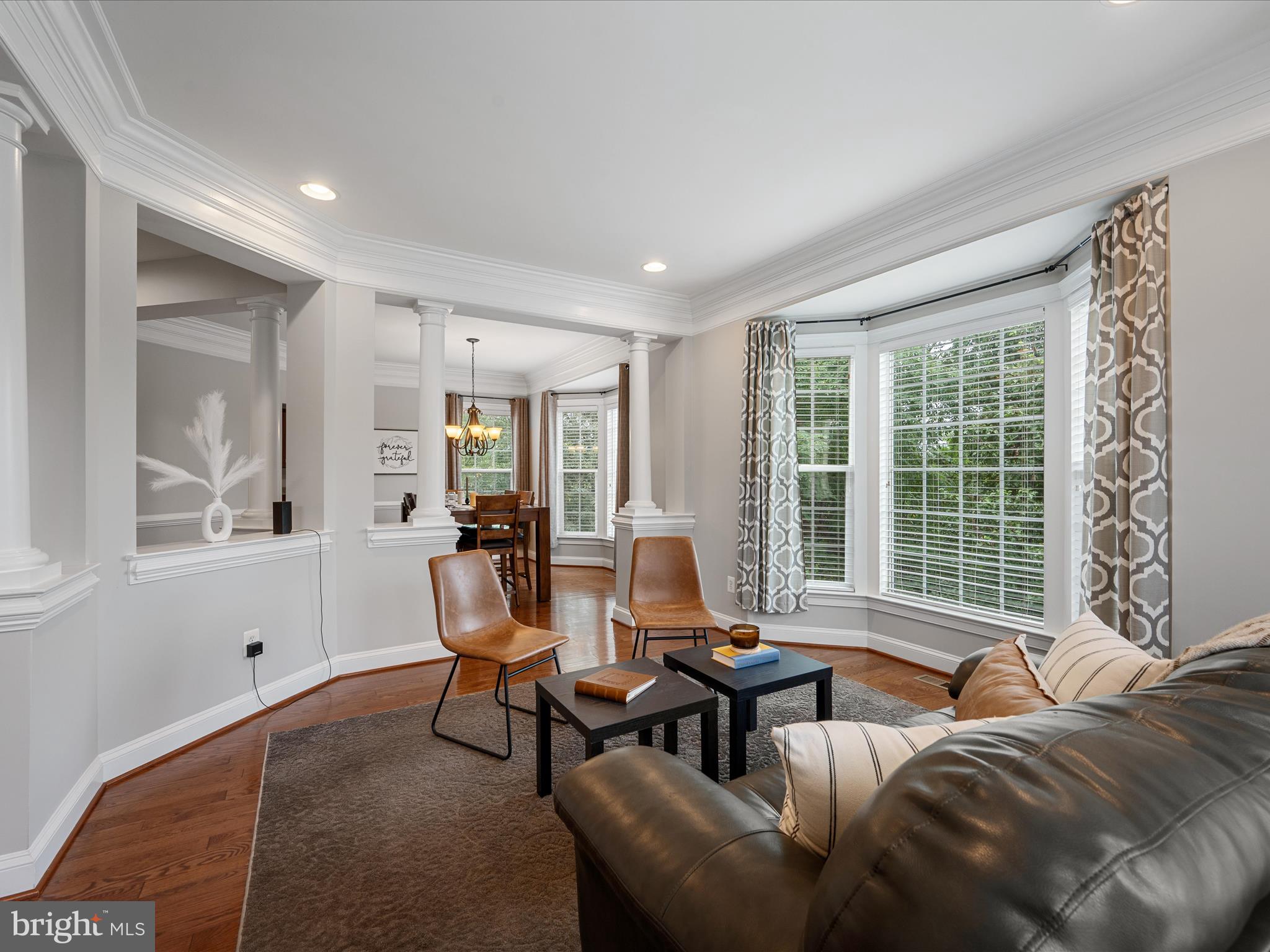 103 Prairie Place Stephenson, VA 22656 - Photo 7 of 90 a living room with furniture and a large window