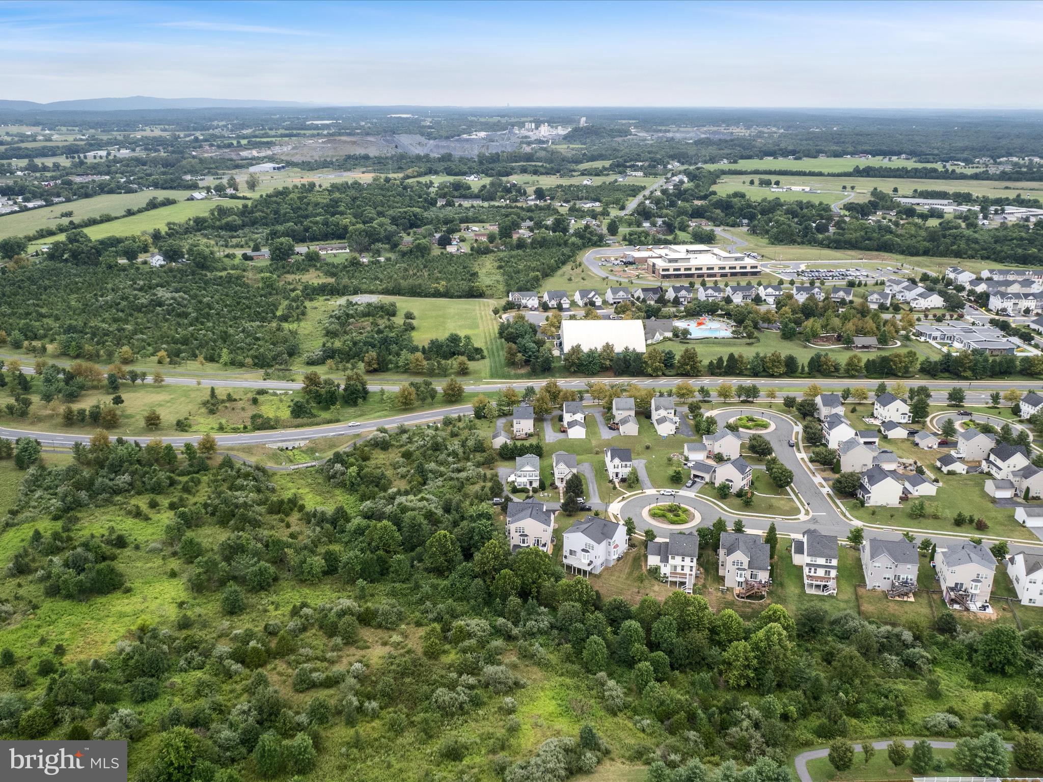 103 Prairie Place Stephenson, VA 22656 - Photo 72 of 90 an aerial view of residential building with outdoor space