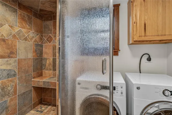 a bathroom with a sink and a shower