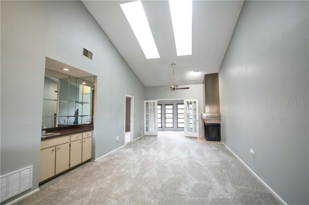 4314 Middlebrook Road, Unit 1 Orlando, FL 32811 - Photo 1 of 1 Living Room, High Ceiling, Natural light from Skylights