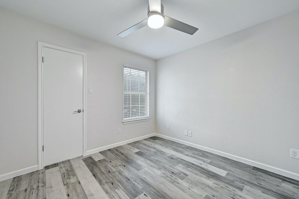 2320 Riddle Road, Unit A Austin, TX 78748 - Photo 19 of 25 wooden floor in an empty room