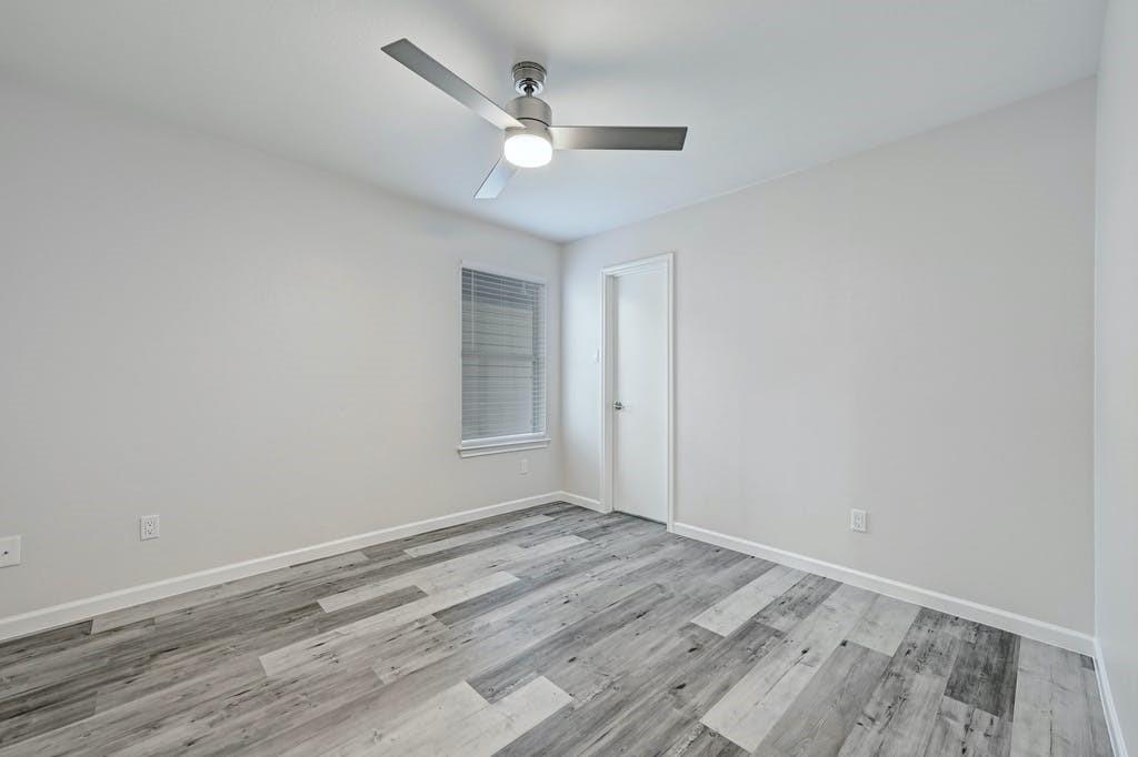 2320 Riddle Road, Unit A Austin, TX 78748 - Photo 20 of 25 wooden floor in an empty room