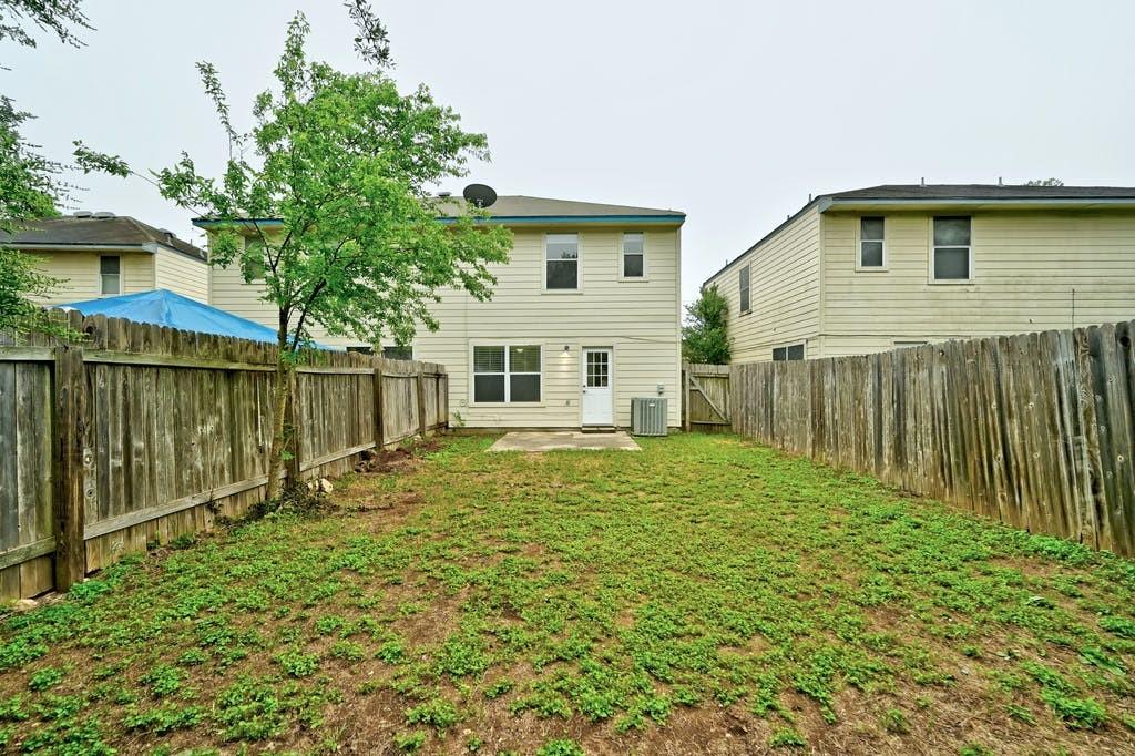 2320 Riddle Road, Unit A Austin, TX 78748 - Photo 24 of 25 a house with trees in the background