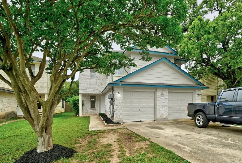 2320 Riddle Road, Unit A Austin, TX 78748 - Photo 4 of 25 a view of a house with a yard