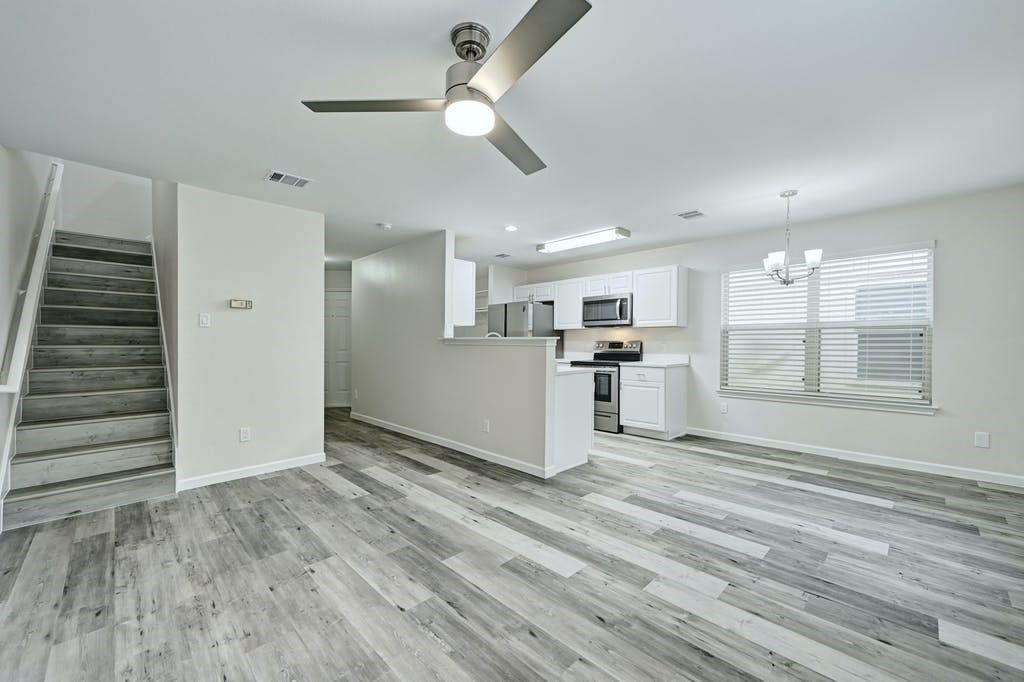 2320 Riddle Road, Unit A Austin, TX 78748 - Photo 9 of 25 a view of large kitchen with wooden floor and window