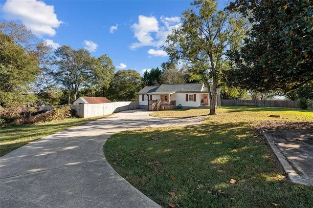 a view of a house with a swimming pool