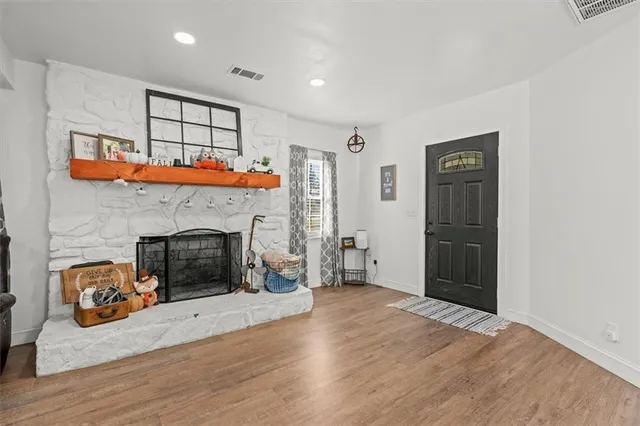 a bedroom with a bed and a table