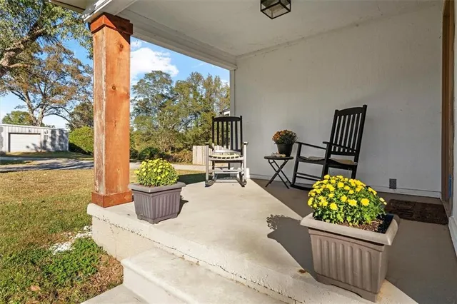 a garden view with a seating space