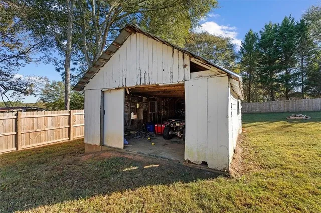view of a house with a yard