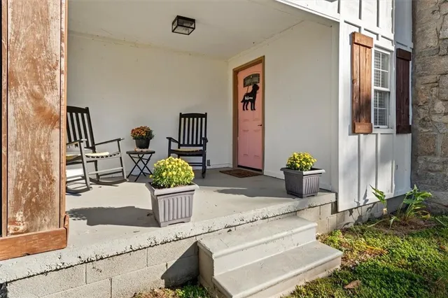 a view of porch with seating space