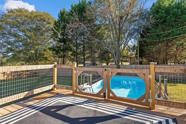 a view of a house with a big yard