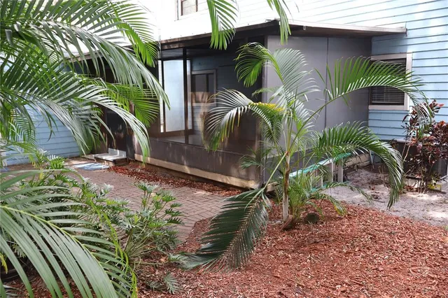 a backyard of a house with seating space