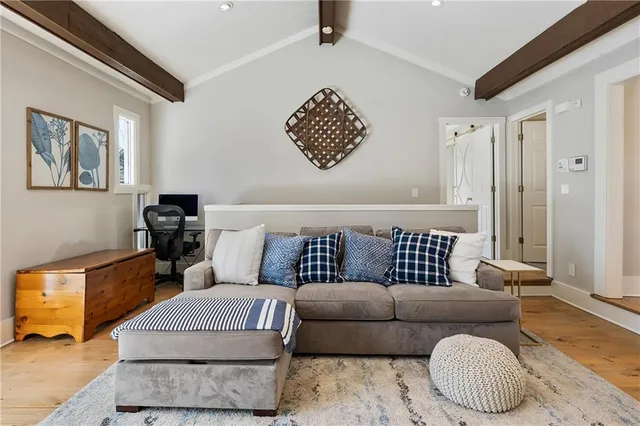 a living room with furniture and a couch