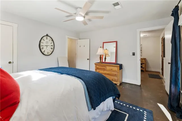 a view of a house with a yard covered in snow