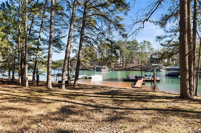an aerial view of lake residential house with outdoor space