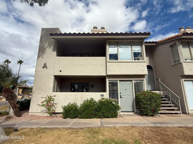 a view of house with yard